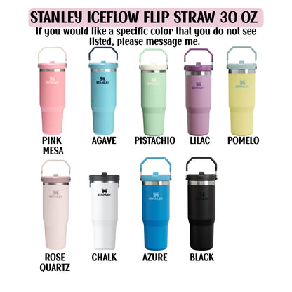 a collection of nine stainless steel tumblers in various colors, including pink, blue, green, purple, yellow, black, and other colors.