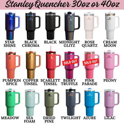 a collection of various colored stainless steel tumblers, including black, silver, pink, and blue, as well as some with different designs and patterns.