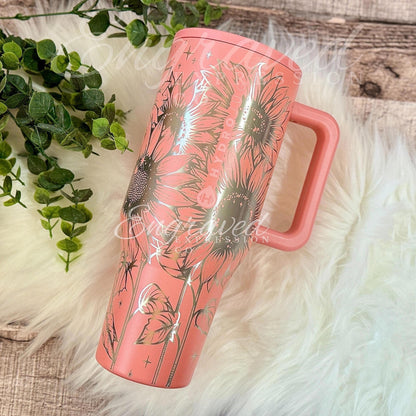 Laser Hydrojug Traveler in Summer Peach etched with a full wrap sunflower engraving.